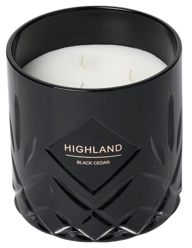 Svart glasburk med treveks doftljus, elegant design.