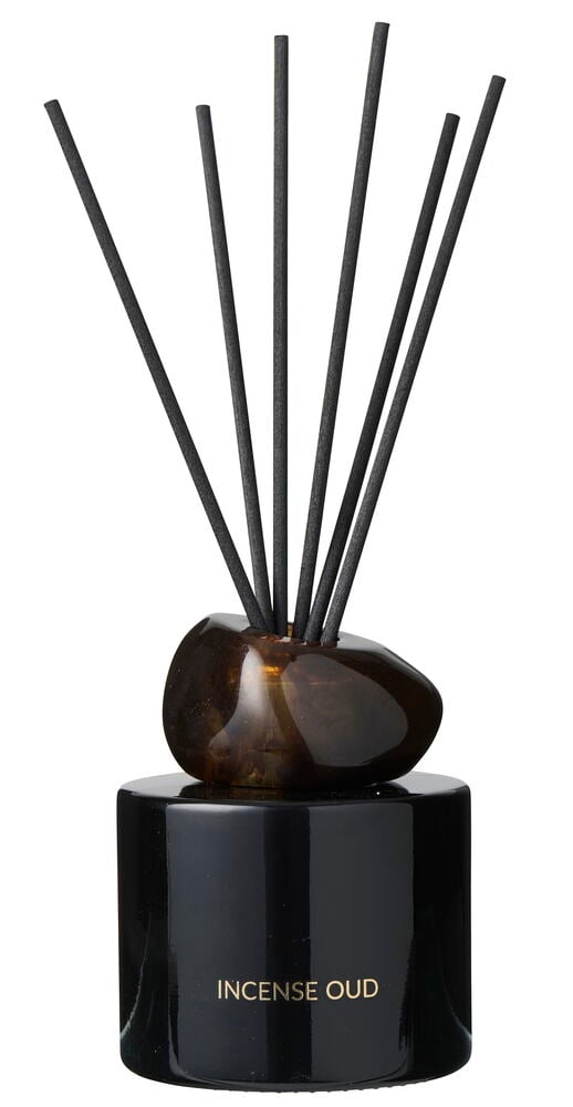 Svart Incense Oud diffuser med mörkbrun oregelbunden kork och svarta rökelsepinnar.