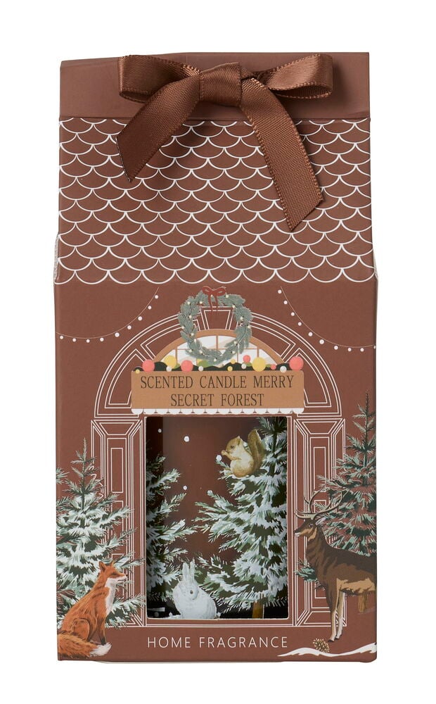 Doftljus Merry i en brun presentförpackning med pepparkakshus, brunt band och vinterdesign.