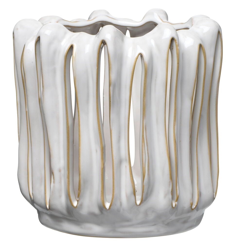 Valkoinen keraaminen lyhty, jossa on orgaaninen kuvio ja aukkoja.