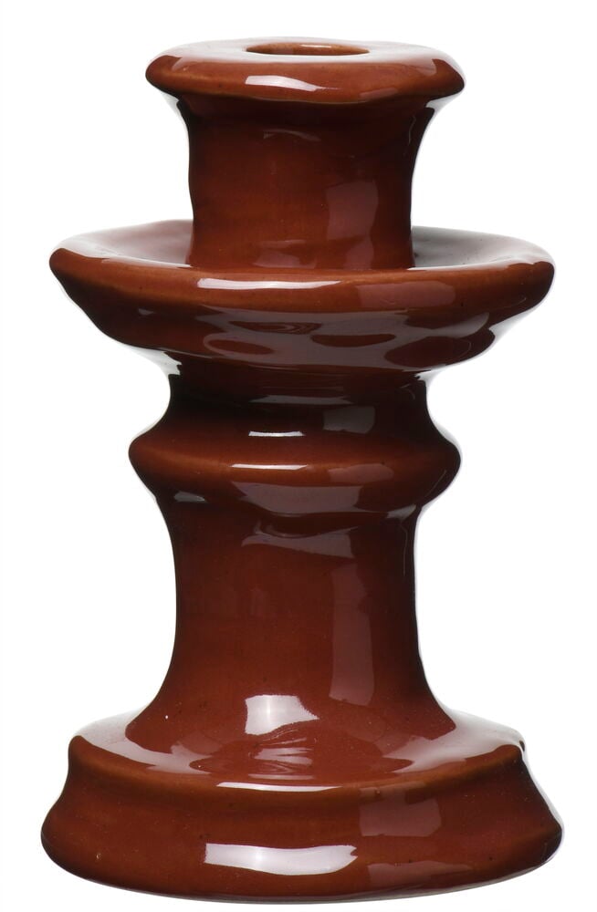 Organisch geformter rostfarbener Kerzenhalter aus Steingut.