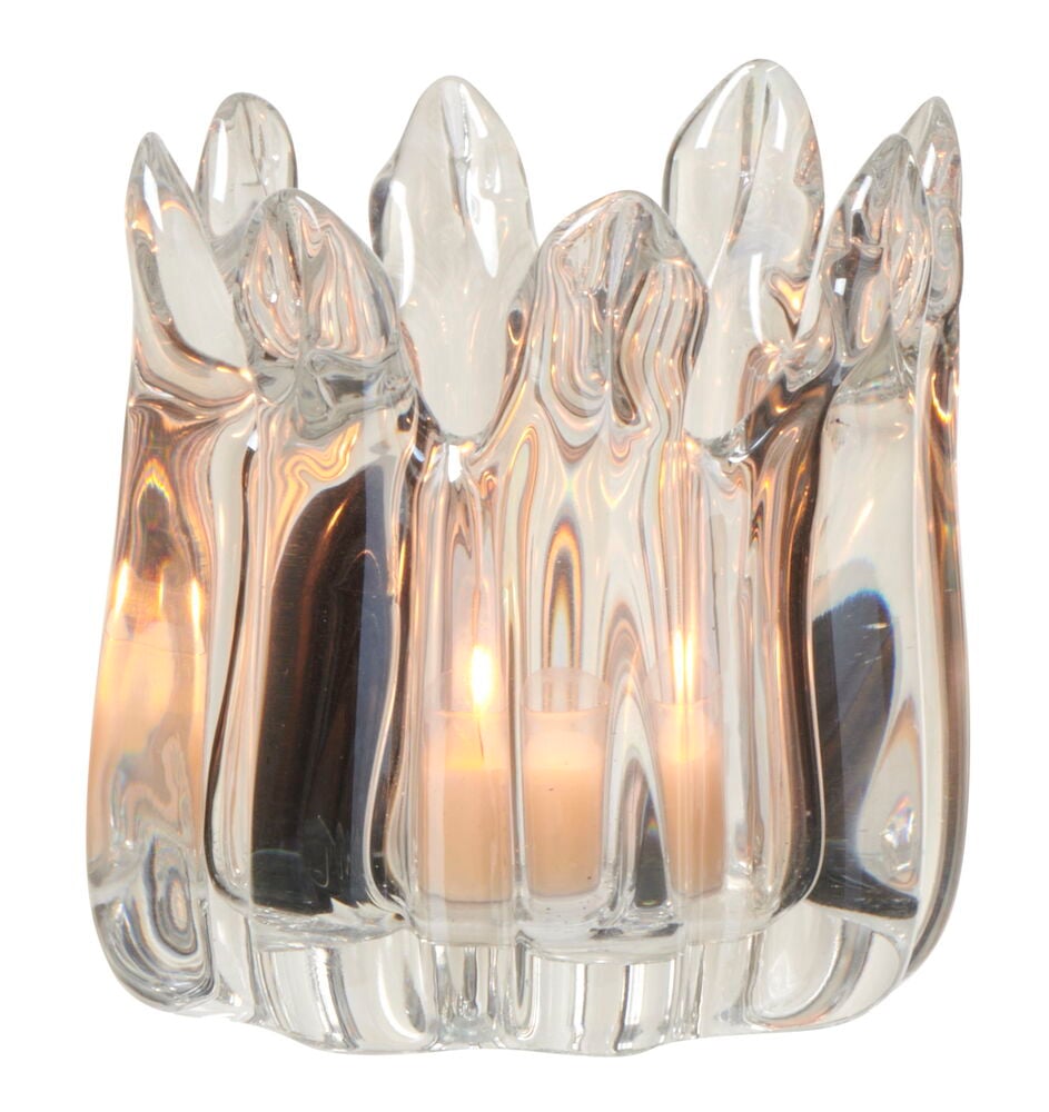 Kynttilälyhty kirkkaasta kuplivasta lasista, jossa on orgaanisia muotoja.