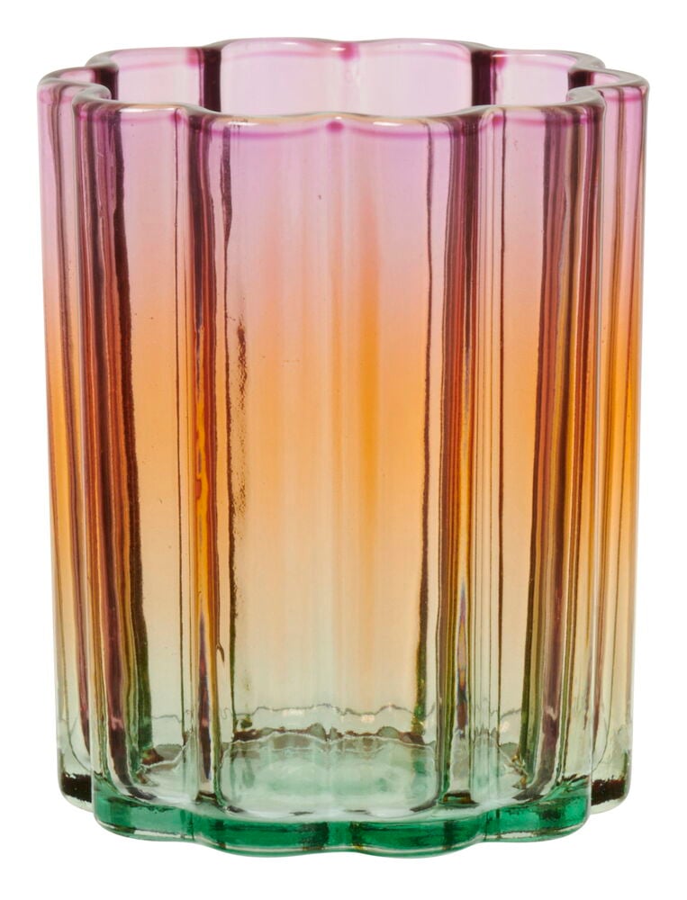 Monivärinen lasinen tuikkukynttilänpidike orgaanisella muodolla.