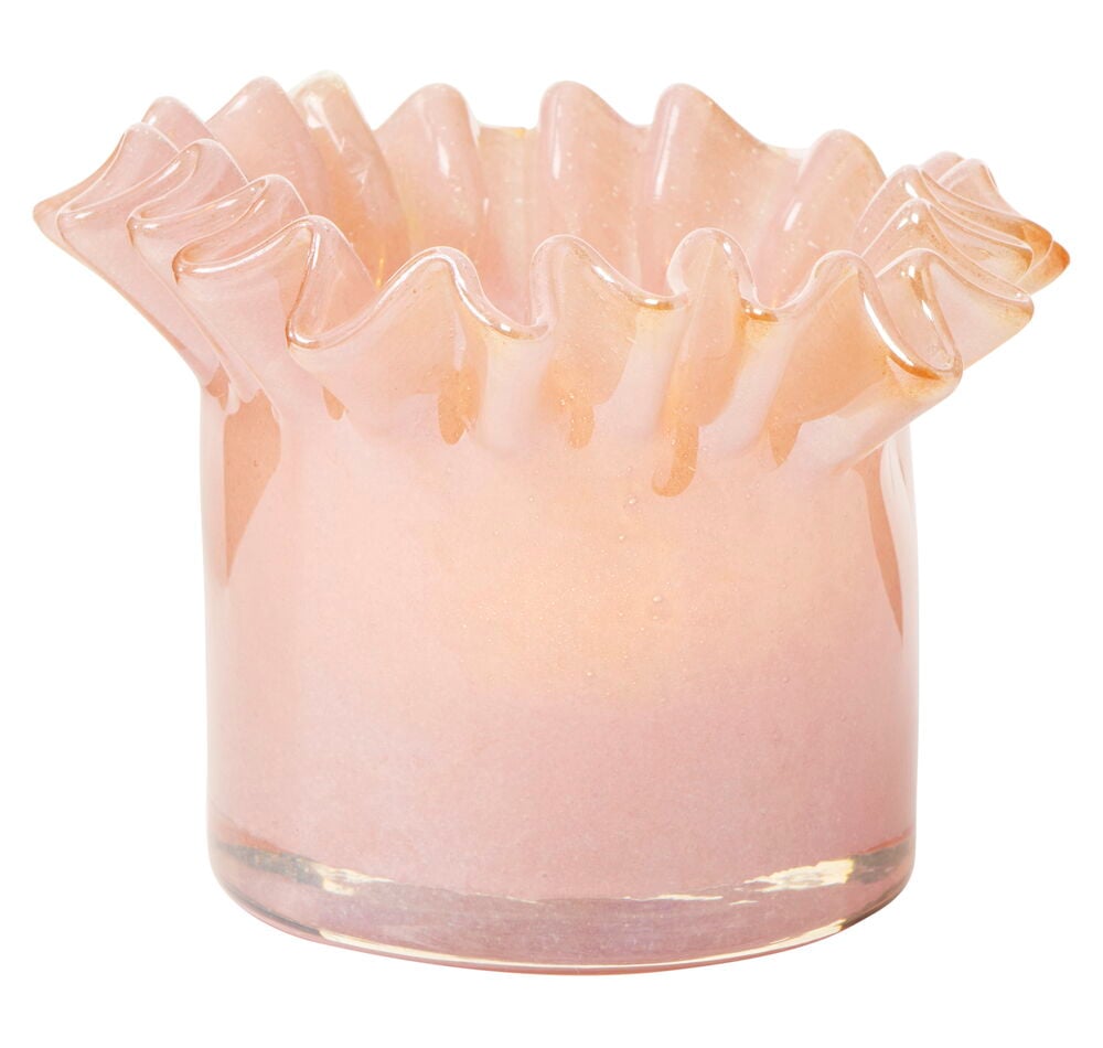 Korallinvärinen tuikkukynttilänpidike lasista, aaltoilevalla reunalla.