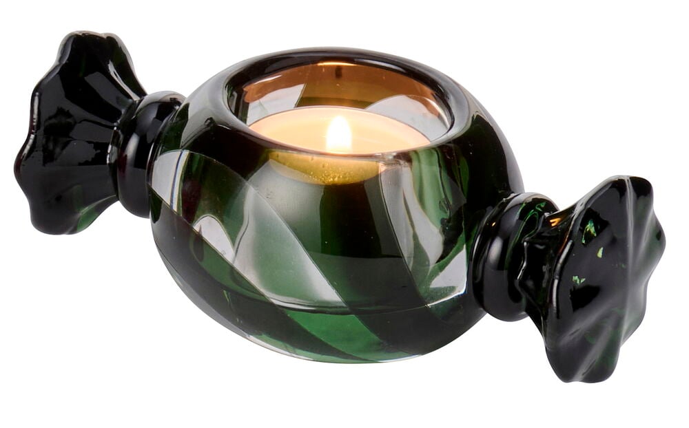 Mørkegrønn og klar telysholder Sweetie Glass, formet som en innpakket karamell med et tent telys.