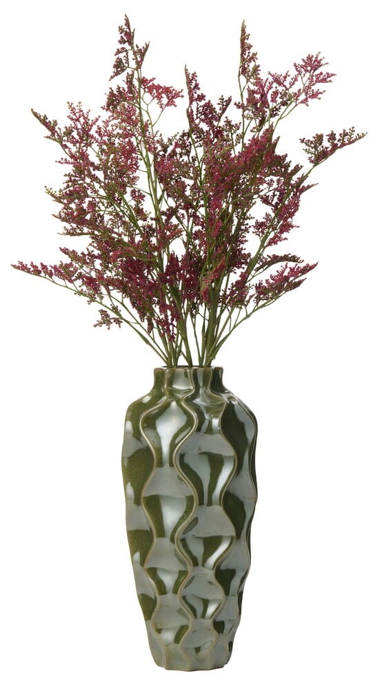 Röda Risp 75 cm blommor arrangerade i en hög, vågig grön keramikvas.