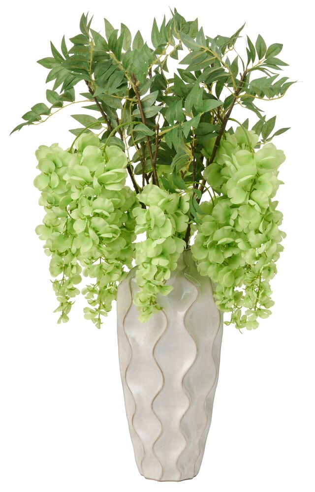 Blåregn 75 cm Grön konstgjorda blommor med stora gröna blommor i en vågig vit vas.