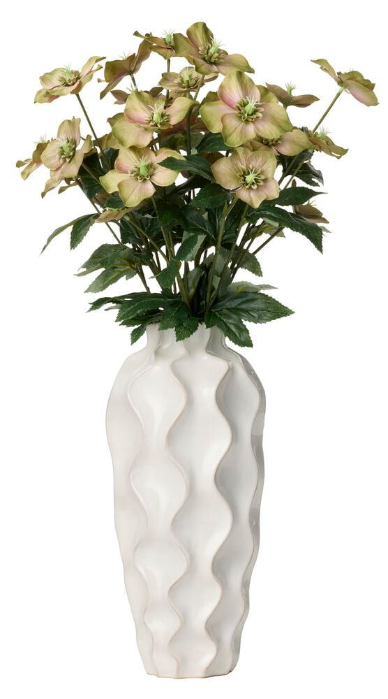 Julerose 60 cm Grønn bukett med flere grønnrosa blomster arrangert i en høy, hvit bølget vase.