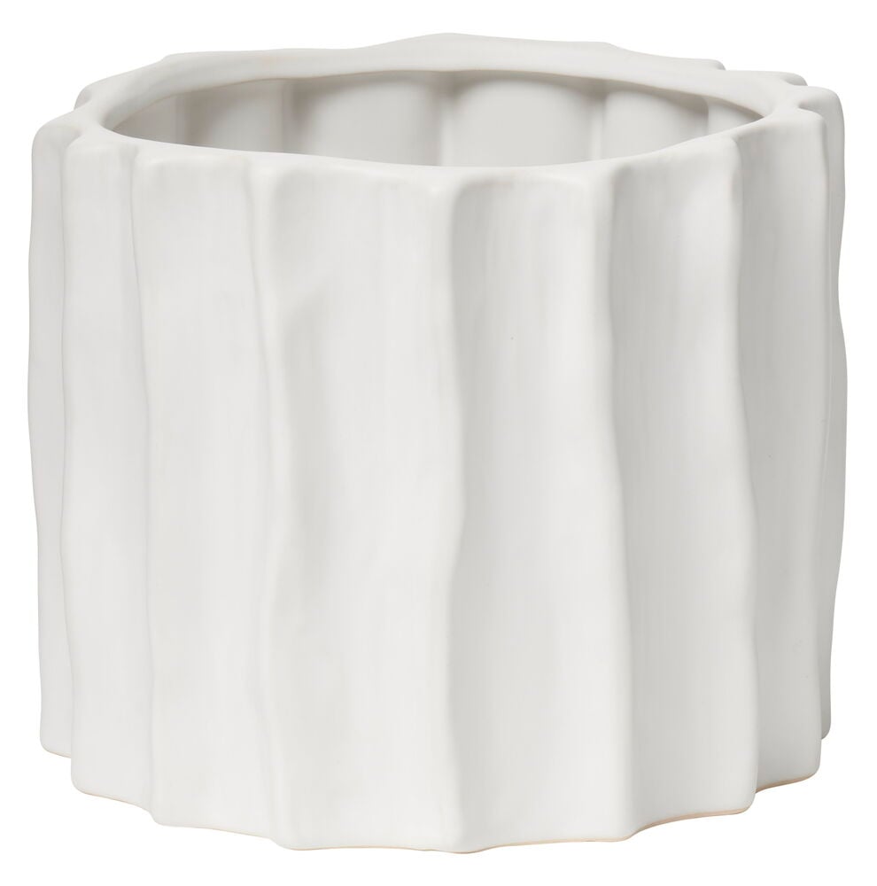 Valkoinen ruukku, jossa on orgaanisesti aaltoileva kohokuvio.