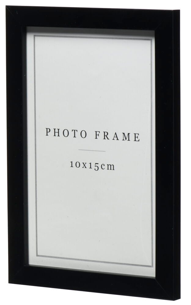 Svart fotoram med glas och passepartout.
