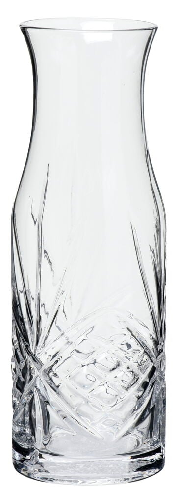 Transparent karaff i glas med reliefmönster.