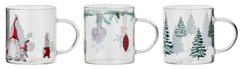 Tre Glöggmuggar i klart glas med julmotiv av tomtar, prydnader och granar.