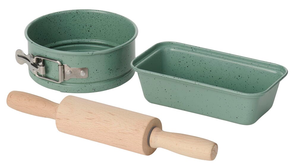Grönt fläckigt Bakset barn med springform, en rektangulär form och en kavel.