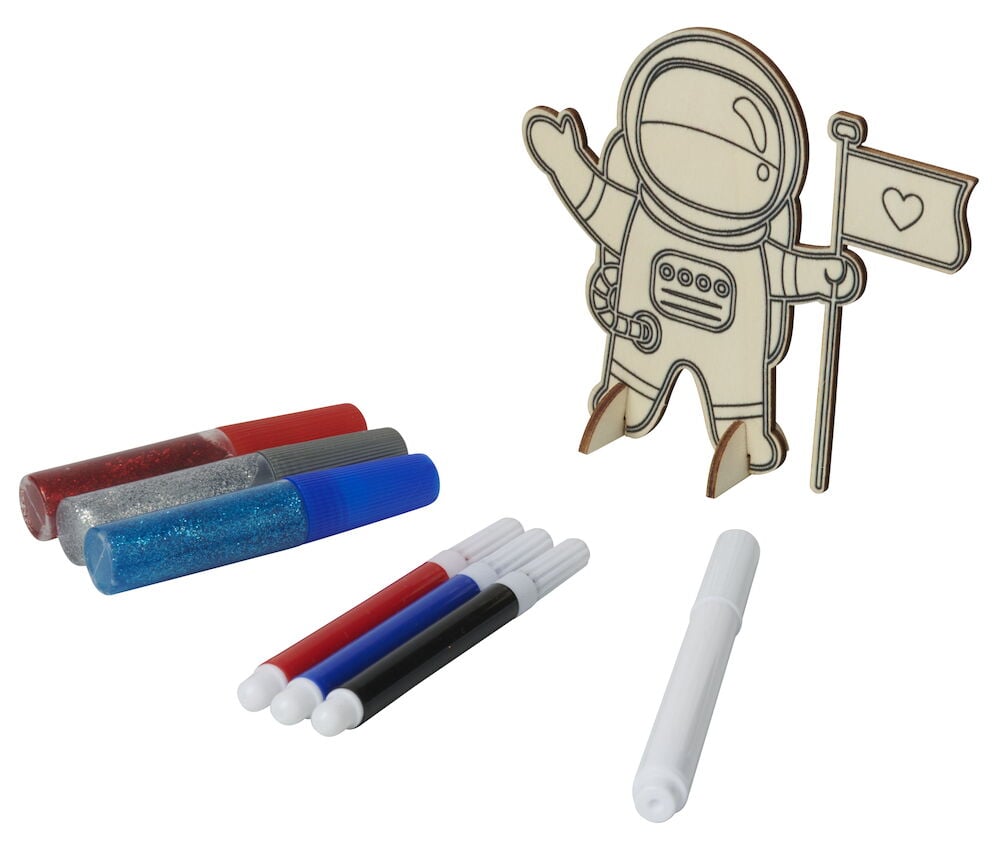 Puispatsas astronautti lipun, kynien ja kimaltavien kynien kanssa.