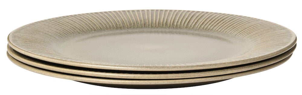 Kolme beigeä lautasta koristellulla reunalla.