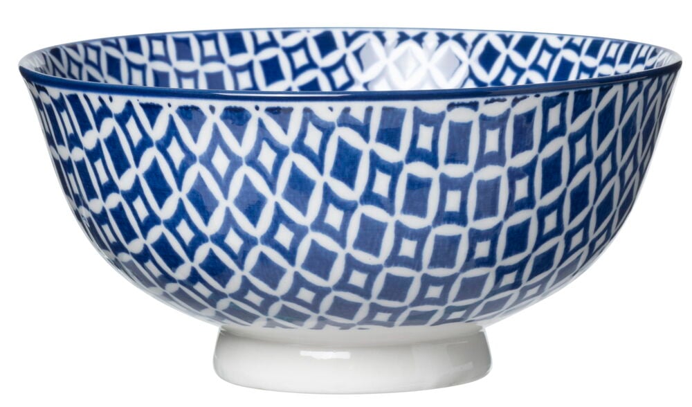 Sininen kivitavarakulho, jossa on valkoinen geometrinen kuvio.