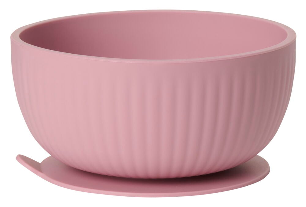 Rosa silikonbarnskål med räfflad yta och sugpropp.