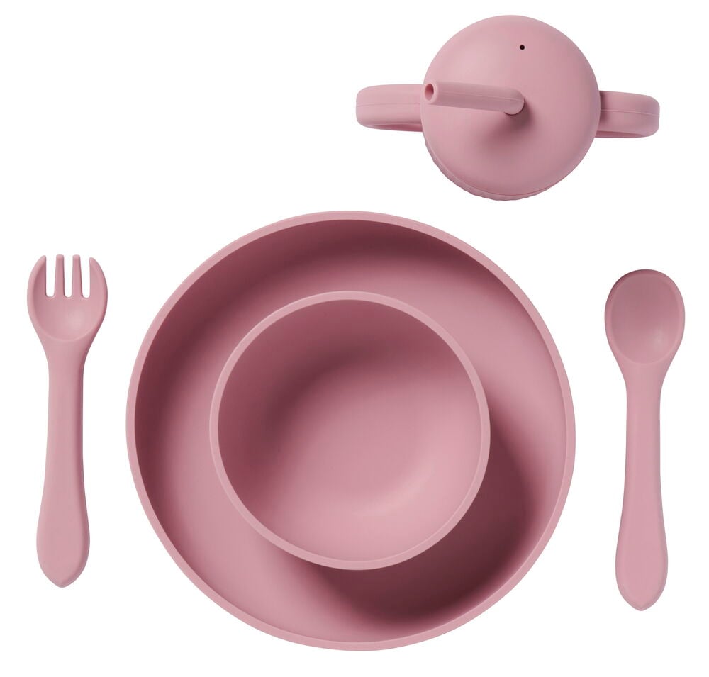 Vaaleanpunainen silikoninen tarjoilusetti pienille lapsille.