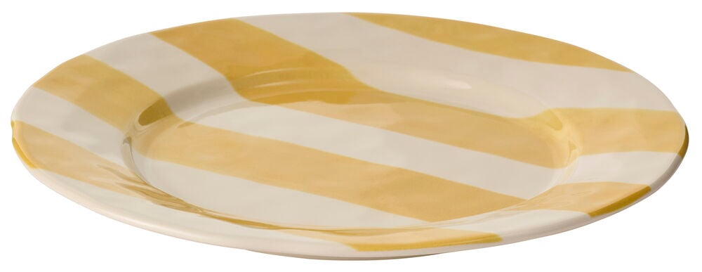 Keltavalkoinen lautanen, jossa on vinoraitoja.