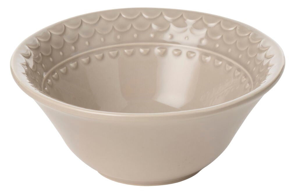 En beige steingodsskål, Nora 17 cm, med bølgede og prikkete mønstre på innerkanten.