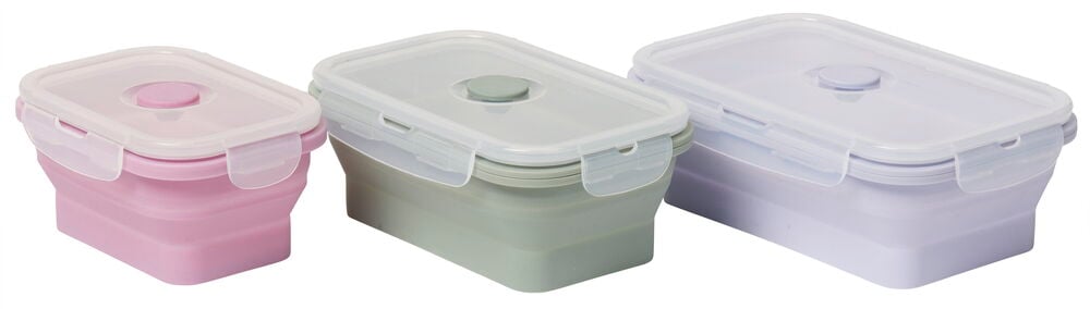 Tre hopfällbara silikonmatlådor i rosa, grön, lila.