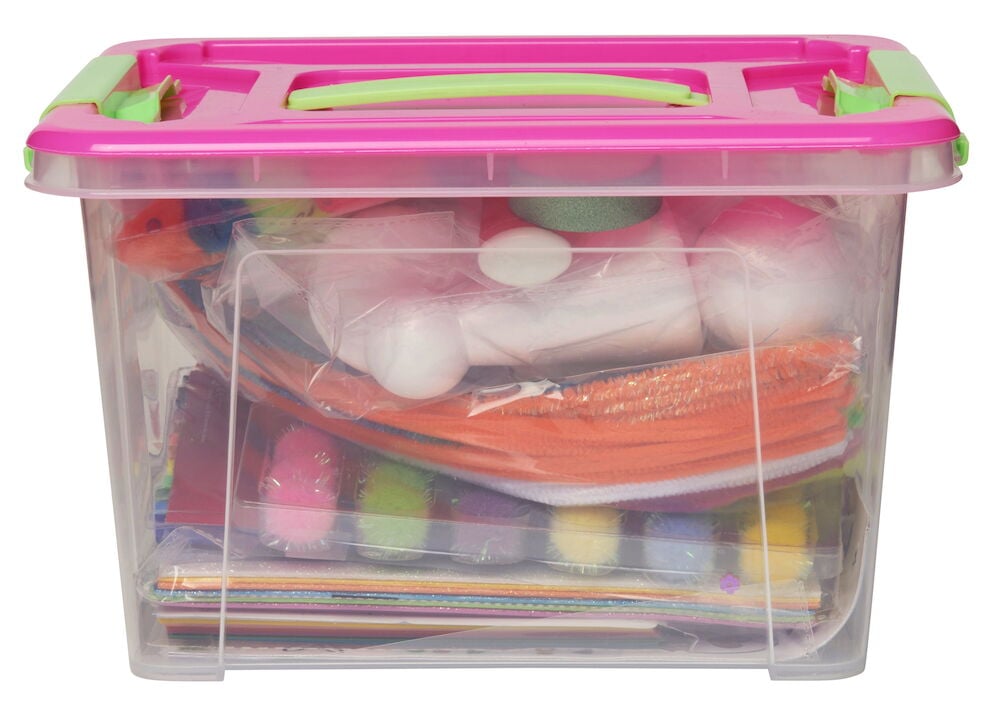 Genomskinlig pyssellåda med färgglada hobbytillbehör.