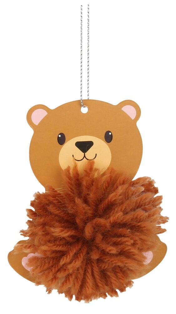 Brun björnfigur med mjuk pompom och snöre.