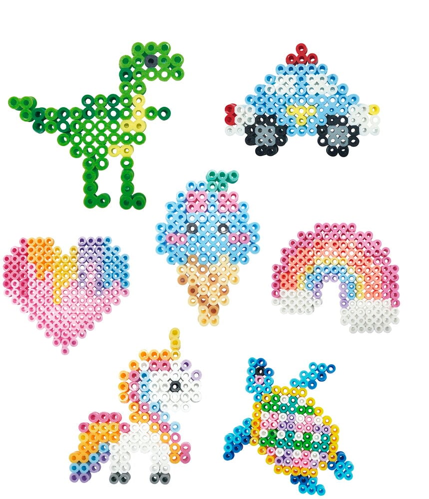 Seitsemän silityshelmi luomusta: vihreä dinosaurus, sininen auto, monivärinen sydän, jäätelö, sateenkaari, yksisarvinen ja kilpikonna.