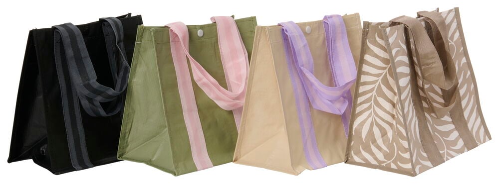 Fire lunsjvesker i ulike farger og mønstre.