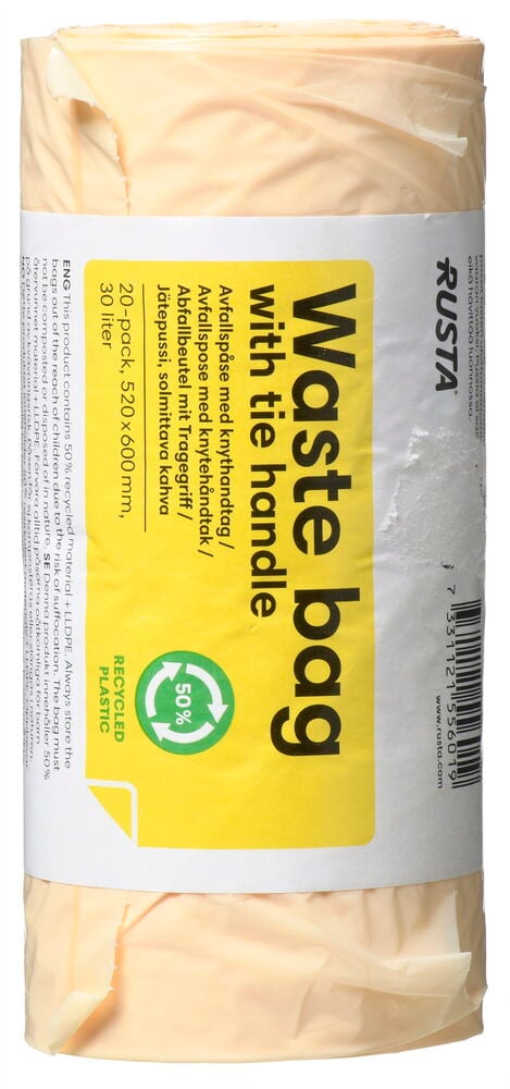 Eine Rolle beige Müllbeutel mit gelbem Etikett.