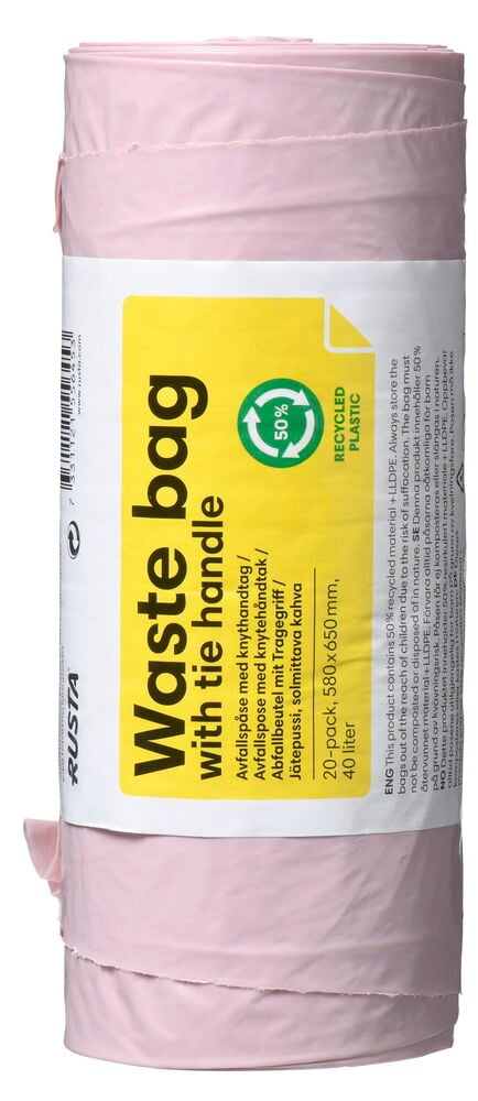 En rosa rulle avfallspåsar med etikett.
