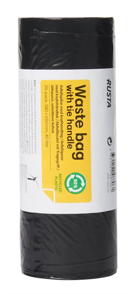 En rulle svarta soppåsar med etikett.