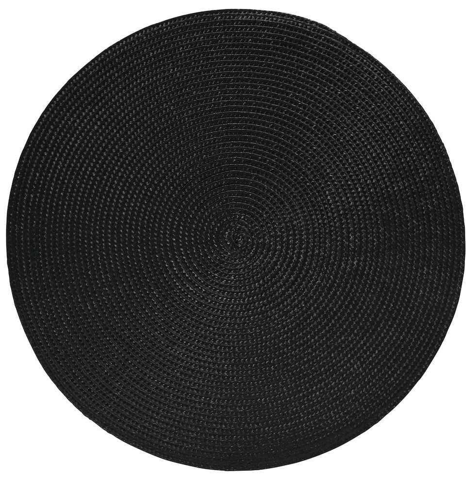 Pyöreä musta pöytätabletti kudottua muovia.