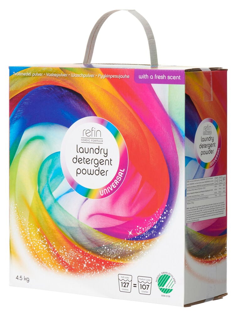 Flerfärgad förpackning med tvättmedelspulver och bärhandtag.
