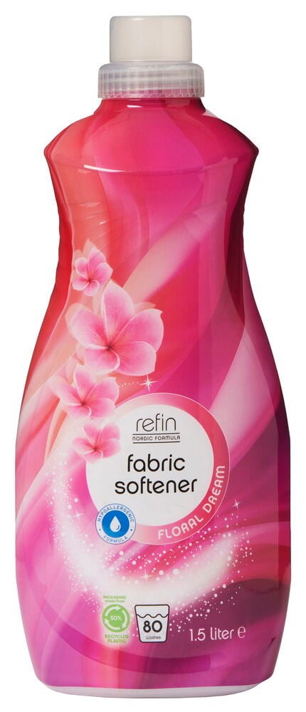 Rosa flaska sköljmedel med blommotiv och etikett.