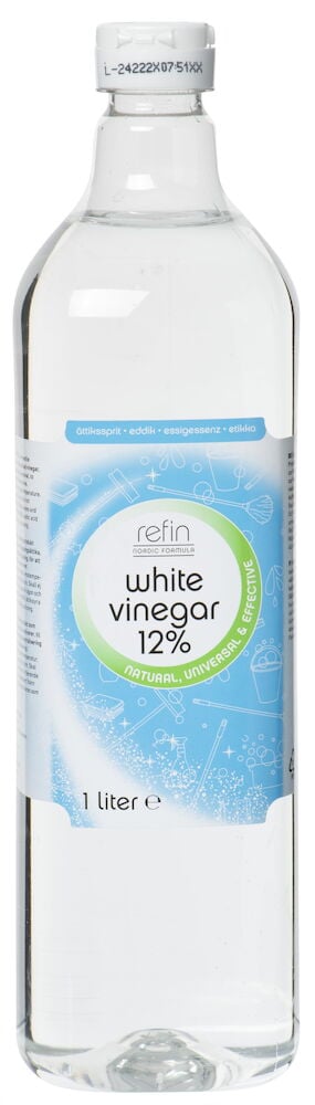 Gjennomsiktig plastflaske med blå etikett og eddiksyre.