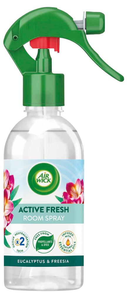 Ilmanraikastinsuihke Air Wick Active Fresh, kirkas pullo, vihreä laukaisin ja etiketti vaaleanpunaisilla kukilla.