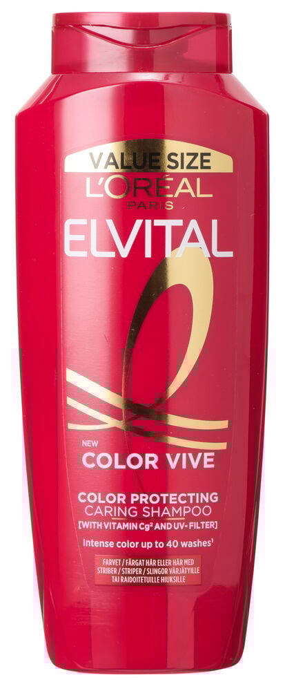 Röd schampoflaska för färgat hår med text.