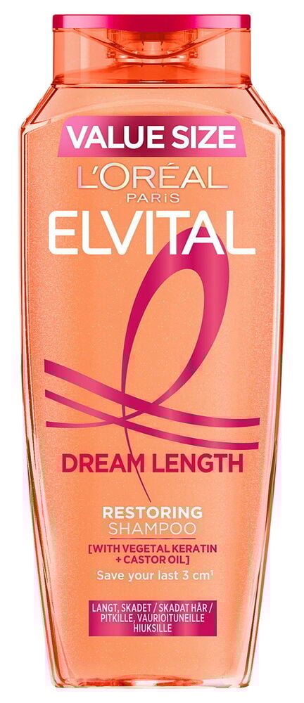 Oranssi shampoopullo, jossa on vaaleanpunainen korkki ja etiketti.