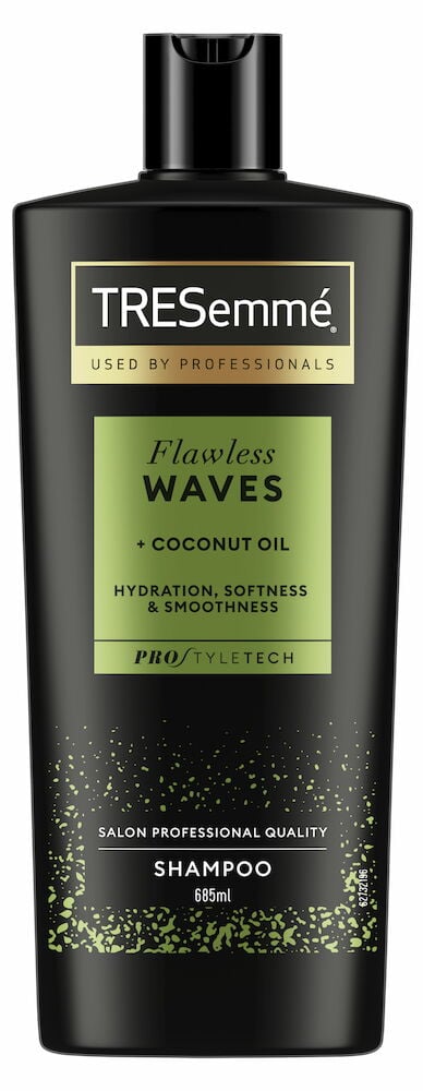 Musta shampoopullo, jossa on vihreä etiketti ja muovikorkki.