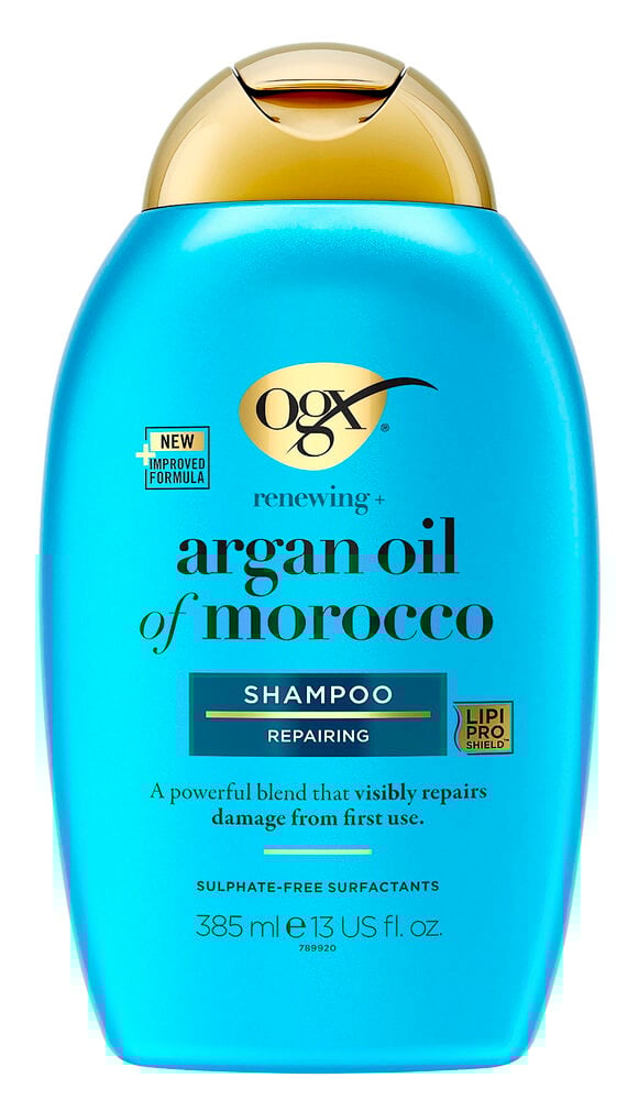 Blå flaska med guldlock ogx marockansk arganolja schampo.