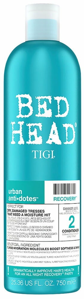 Blå flaska med vitt lock och vit text.