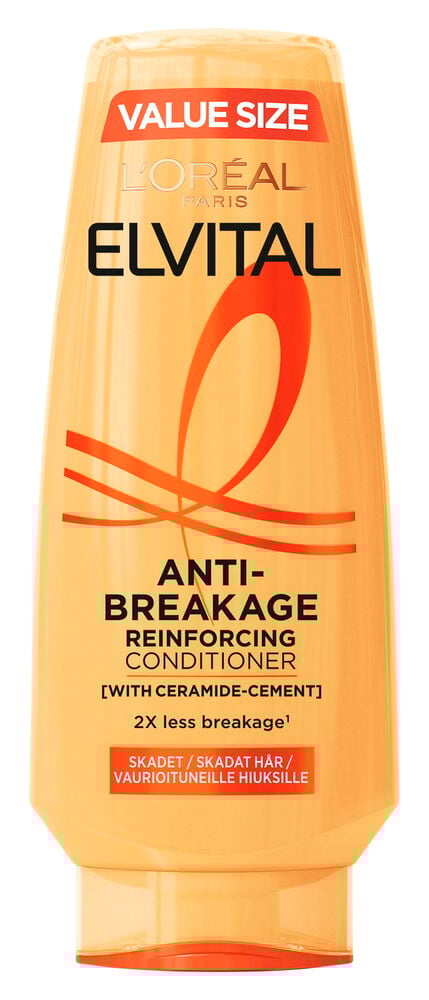 Orange balsamflaska med röd text för skadat hår.