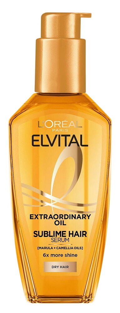 Läpinäkyvä pumppupullo, jossa kullansävyistä hiusöljyä.