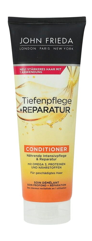 Eine schwarz-gelb-orangefarbene Tube John Frieda Intense Care & Repair Pflegespülung mit rotem Streifen.