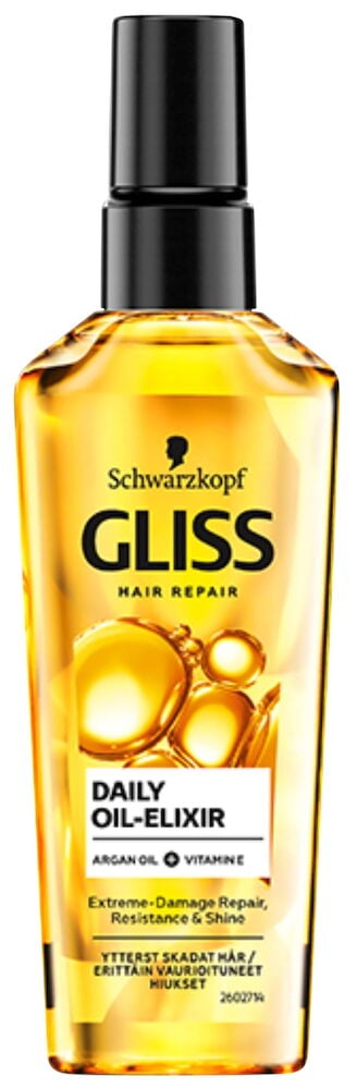 Keltainen muovipullo mustalla pumppuosalla ja etiketillä.