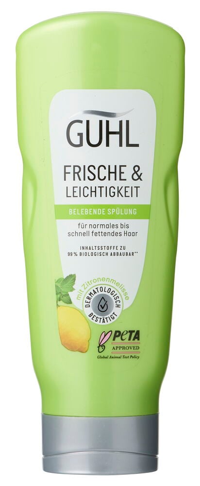 Hellgrüne Guhl Pflegespülungsflasche mit weißem Etikett, Zitrone, Minze und silbernem Verschluss.
