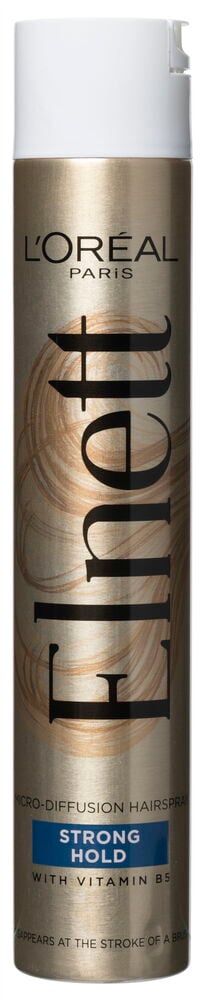 Guldfärgad hårsprayburk med vit spraytopp.