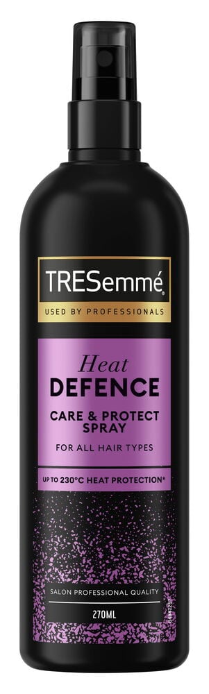 Svart sprayflaska med lila etikett för hårskydd.