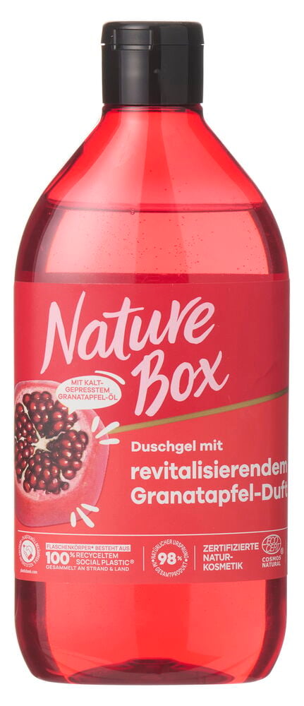 Rote Nature Box Granatapfel Duschgelflasche mit schwarzem Verschluss und weißem Etikett mit einem Granatapfel.